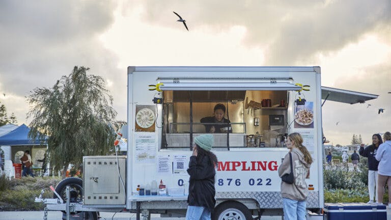 Dinner at Dusk dumpling food truck at sunset with diners